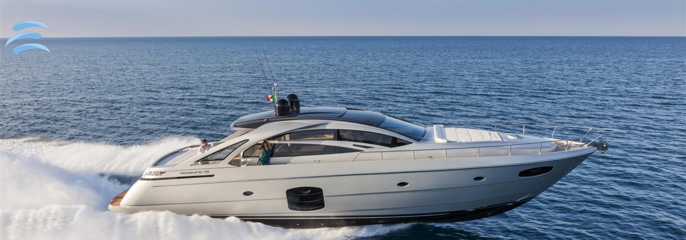 Private yacht cruising along the coastline
