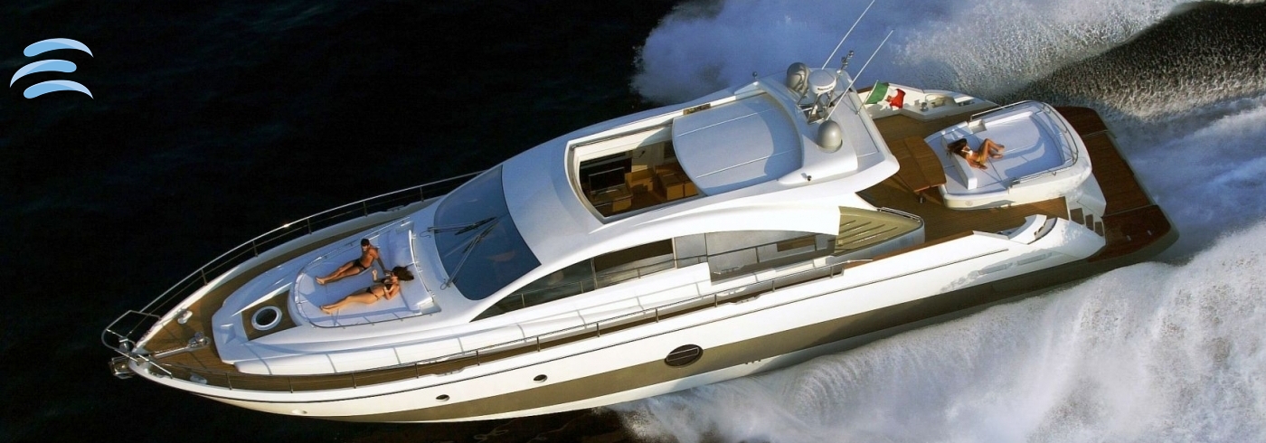 Private yacht cruising along the coastline