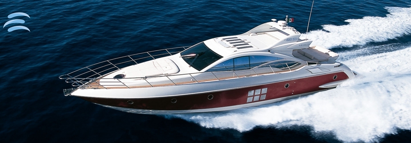 Private yacht cruising along the coastline